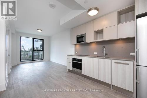 219 - 118 Merchants' Wharf, Toronto (Waterfront Communities), ON - Indoor Photo Showing Kitchen