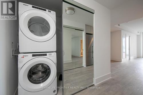 219 - 118 Merchants' Wharf, Toronto (Waterfront Communities), ON - Indoor Photo Showing Laundry Room