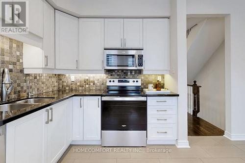 Th #1 - 116 Evans Avenue, Toronto (Mimico), ON - Indoor Photo Showing Kitchen With Double Sink