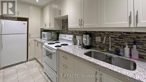 Ph82 - 1 Greystone Walk Drive, Toronto (Kennedy Park), ON - Indoor Photo Showing Kitchen With Double Sink