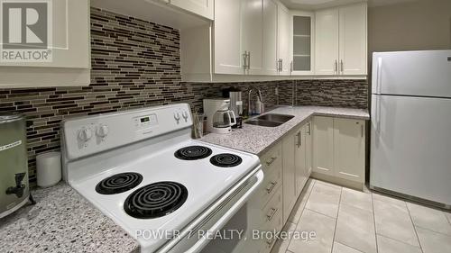 Ph82 - 1 Greystone Walk Drive, Toronto (Kennedy Park), ON - Indoor Photo Showing Kitchen With Double Sink