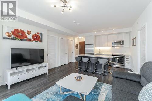 C318 - 301 Sea Ray Avenue, Innisfil, ON - Indoor Photo Showing Living Room