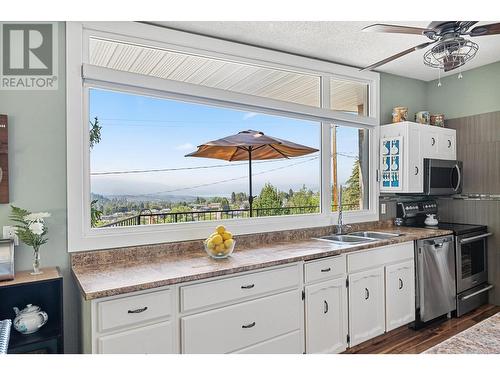 1301 Begley Road, Kelowna, BC - Indoor Photo Showing Kitchen With Double Sink