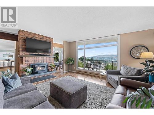 1301 Begley Road, Kelowna, BC - Indoor Photo Showing Living Room With Fireplace