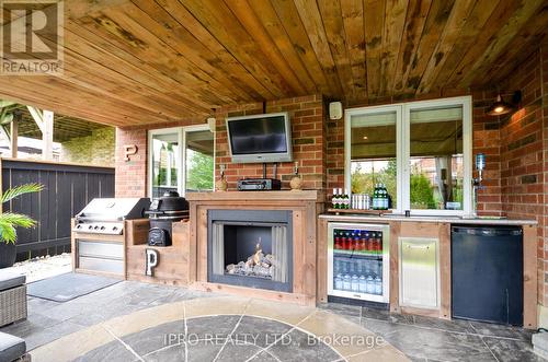 21 Coutts Court, Guelph, ON - Outdoor With Fireplace With Deck Patio Veranda