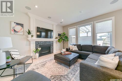 4432 Sage Drive, Regina, SK - Indoor Photo Showing Living Room With Fireplace