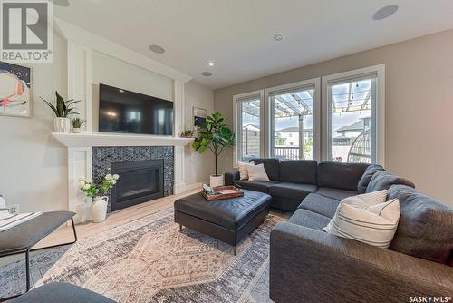 4432 Sage Drive, Regina, SK - Indoor Photo Showing Living Room With Fireplace