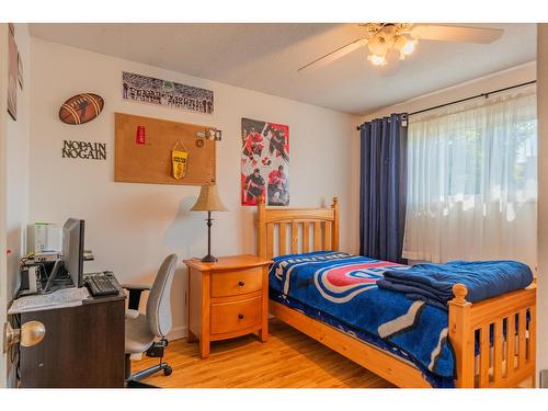 103 Johnson Road, Fruitvale, BC - Indoor Photo Showing Bedroom