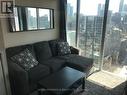 3302 - 126 Simcoe Street, Toronto (Waterfront Communities), ON  - Indoor Photo Showing Living Room 