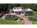 2194 Highway 3A, Nelson, BC  - Outdoor With Deck Patio Veranda With Facade 