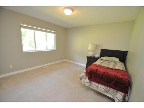 2194 Highway 3A, Nelson, BC - Indoor Photo Showing Bedroom