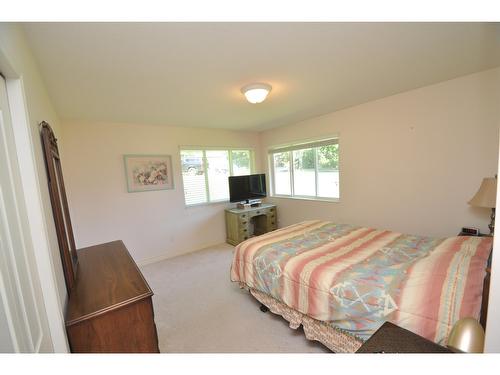 2194 Highway 3A, Nelson, BC - Indoor Photo Showing Bedroom