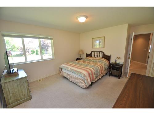 2194 Highway 3A, Nelson, BC - Indoor Photo Showing Bedroom