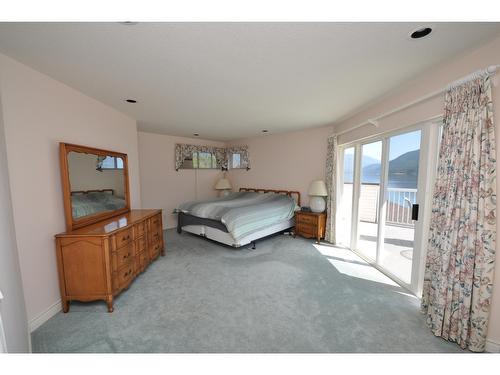 2194 Highway 3A, Nelson, BC - Indoor Photo Showing Bedroom