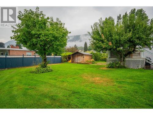 534 14Th  Avenue, Genelle, BC - Outdoor With Backyard