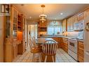 534 14Th  Avenue, Genelle, BC  - Indoor Photo Showing Kitchen With Double Sink 