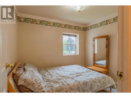 534 14Th  Avenue, Genelle, BC - Indoor Photo Showing Bedroom