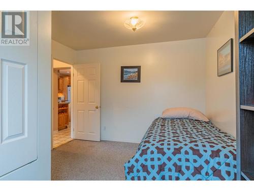 534 14Th  Avenue, Genelle, BC - Indoor Photo Showing Bedroom