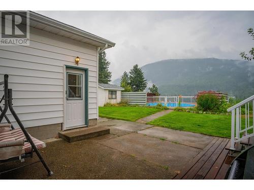 534 14Th  Avenue, Genelle, BC - Outdoor With Deck Patio Veranda With Exterior