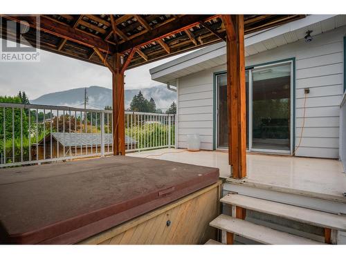 534 14Th  Avenue, Genelle, BC - Outdoor With Deck Patio Veranda With Exterior