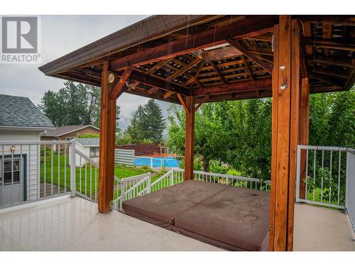 534 14Th  Avenue, Genelle, BC - Outdoor With Deck Patio Veranda With Exterior