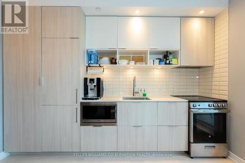 318 - 60 Tannery Road, Toronto (Waterfront Communities), ON - Indoor Photo Showing Kitchen With Upgraded Kitchen