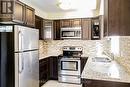 3331 Dovetail Mews, Mississauga, ON  - Indoor Photo Showing Kitchen With Stainless Steel Kitchen With Double Sink With Upgraded Kitchen 