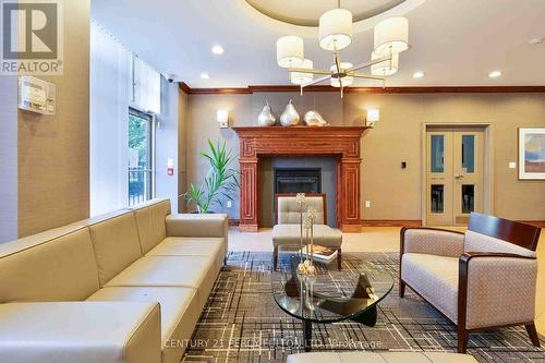 501 - 19 Barberry Place, Toronto (Bayview Village), ON - Indoor Photo Showing Living Room With Fireplace