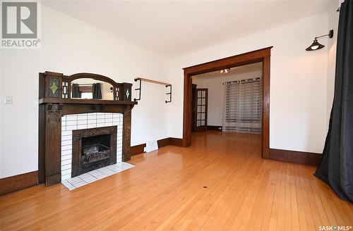 1438 3Rd Street, Estevan, SK - Indoor Photo Showing Living Room With Fireplace