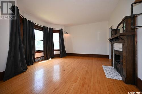 1438 3Rd Street, Estevan, SK - Indoor Photo Showing Other Room With Fireplace