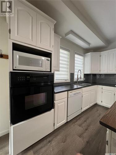 1438 3Rd Street, Estevan, SK - Indoor Photo Showing Kitchen With Double Sink