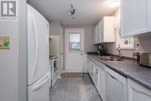 22 Primrose Lane, Innisfil, ON - Indoor Photo Showing Kitchen With Double Sink