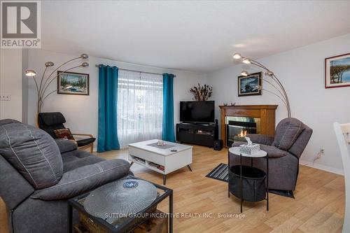 22 Primrose Lane, Innisfil, ON - Indoor Photo Showing Living Room With Fireplace