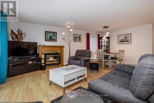 22 Primrose Lane, Innisfil, ON - Indoor Photo Showing Living Room With Fireplace