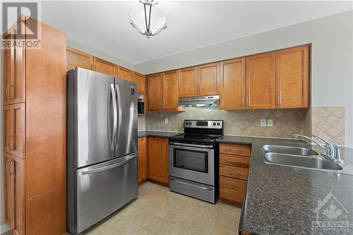 Stainless appliances - 586 Lakeridge Drive, Ottawa, ON - Indoor Photo Showing Kitchen With Double Sink