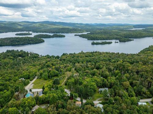 Aerial photo - 1012 Ch. D'Entrelacs, Sainte-Marguerite-Du-Lac-Masson, QC - Outdoor With Body Of Water With View