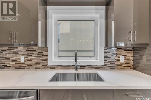 506 Taskamanwa Street, Saskatoon, SK - Indoor Photo Showing Kitchen With Double Sink