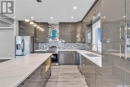 506 Taskamanwa Street, Saskatoon, SK - Indoor Photo Showing Kitchen With Double Sink With Upgraded Kitchen