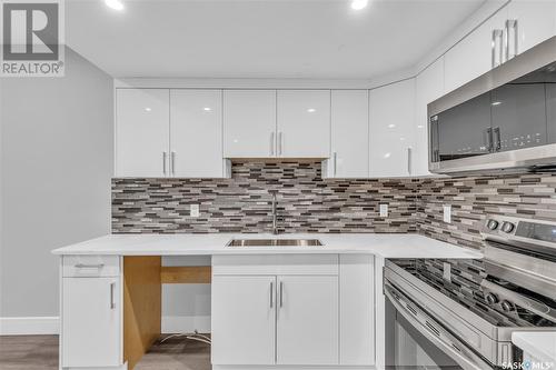 506 Taskamanwa Street, Saskatoon, SK - Indoor Photo Showing Kitchen With Upgraded Kitchen