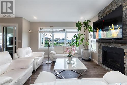 255 Hamm Crescent, Saskatoon, SK - Indoor Photo Showing Living Room With Fireplace