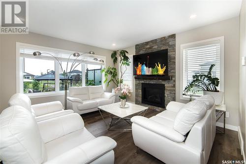 255 Hamm Crescent, Saskatoon, SK - Indoor Photo Showing Living Room With Fireplace