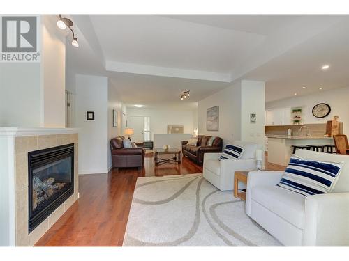 218 Glen Park Drive Unit# 7, Kelowna, BC - Indoor Photo Showing Living Room With Fireplace