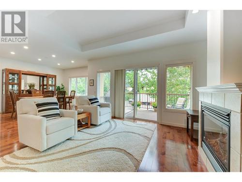 218 Glen Park Drive Unit# 7, Kelowna, BC - Indoor Photo Showing Living Room With Fireplace