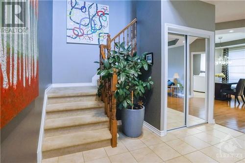 A convenient laundry room and powder room complete the main level. - 500 Kerria Walk, Ottawa, ON - Indoor Photo Showing Other Room