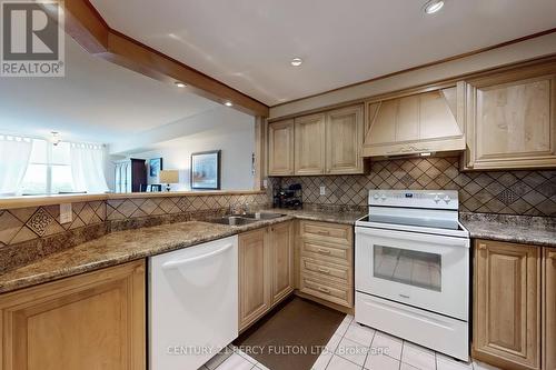 814 - 711 Rossland Road E, Whitby (Pringle Creek), ON - Indoor Photo Showing Kitchen With Double Sink