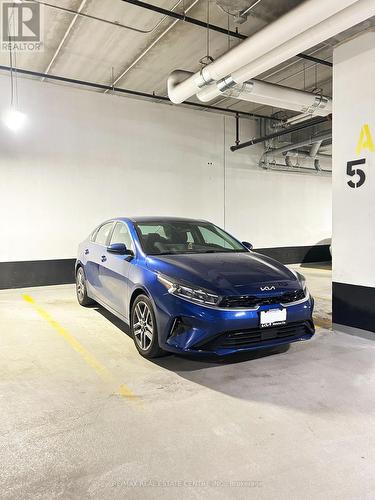 315 - 15 Prince Albert Boulevard, Kitchener, ON - Indoor Photo Showing Garage