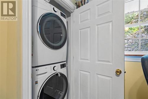 Stackable laundry in Bed 3 on Main Floor - 130 Hartley Street, Brockville, ON - Indoor Photo Showing Laundry Room