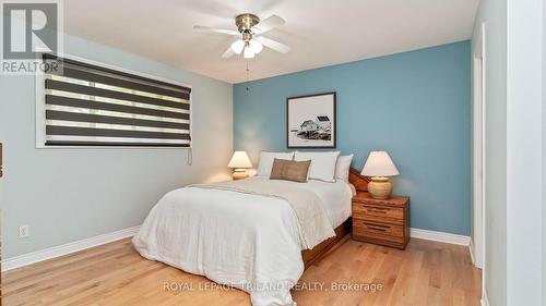 Primary bedroom with walkin closet and built-ins - 21709 Wonderland Road N, Middlesex Centre, ON - Indoor Photo Showing Bedroom