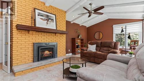 Main floor family room - 21709 Wonderland Road N, Middlesex Centre, ON - Indoor Photo Showing Living Room With Fireplace