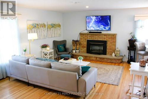 2 Woodland Acres, Belleville, ON - Indoor Photo Showing Living Room With Fireplace